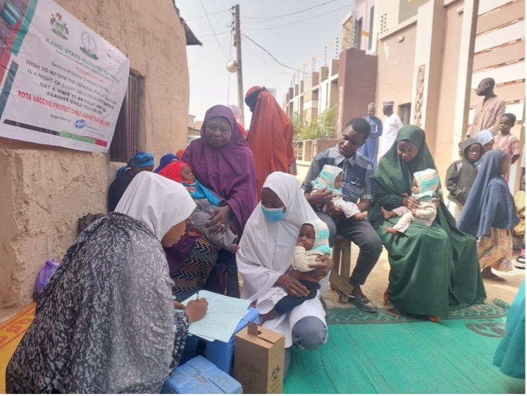 Caption: A healthcare worker records vaccination data for a child immunized against the rotavirus during an outreach session in the Tudun Murtala community, Nasarawa Local Government Area, Kano State, Nigeria. Photo credit: TAConnect