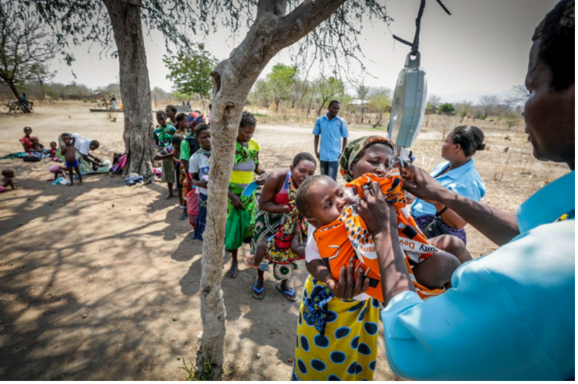 Caption: Community outreach: Child immunization and growth monitoring, Malawi. Photo credit: Paul Joseph Brown, VillageReach